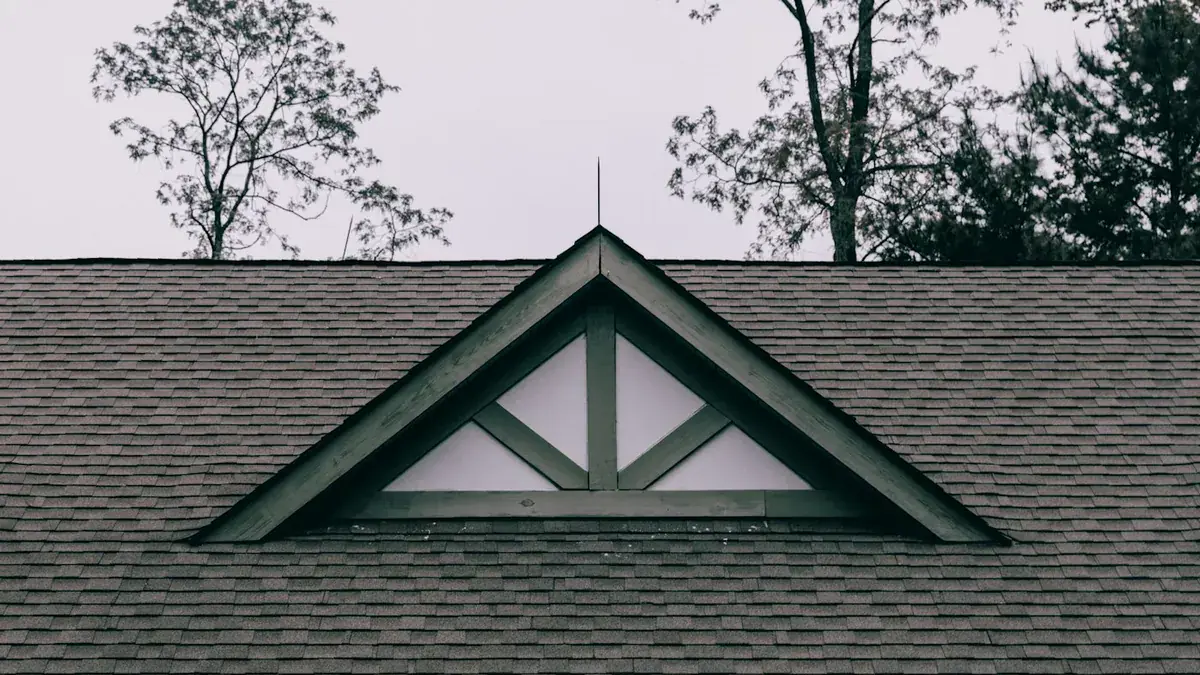 Anthracite grey roofline and bargeboards on the gable end of a UK home
