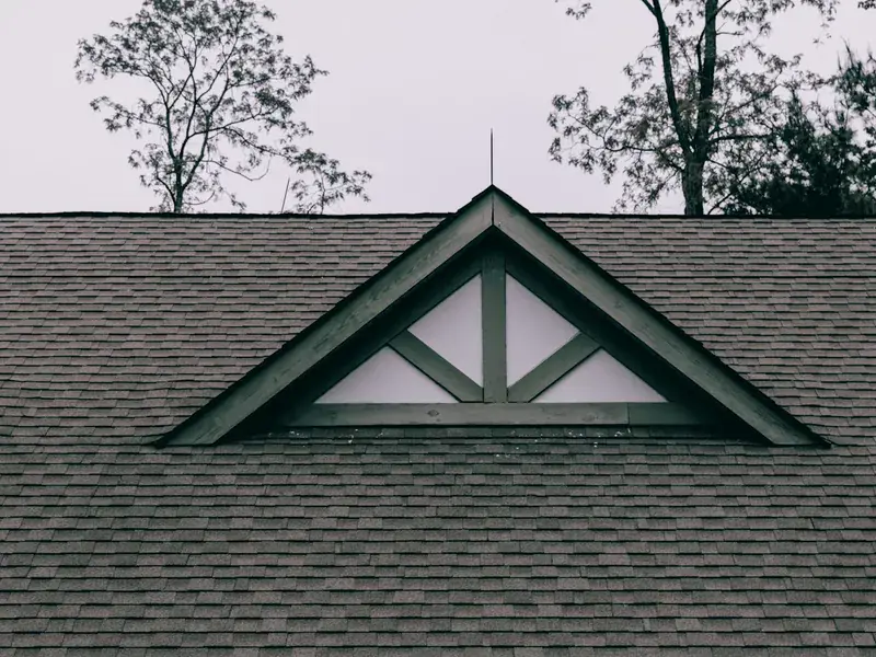 Anthracite grey roofline and bargeboards on the gable end of a UK home