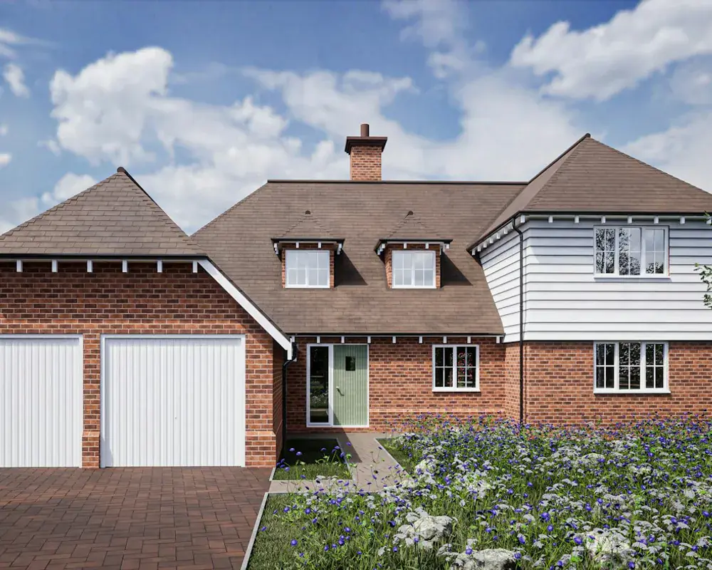 Detached UK brick house with white fascias, soffits and guttering