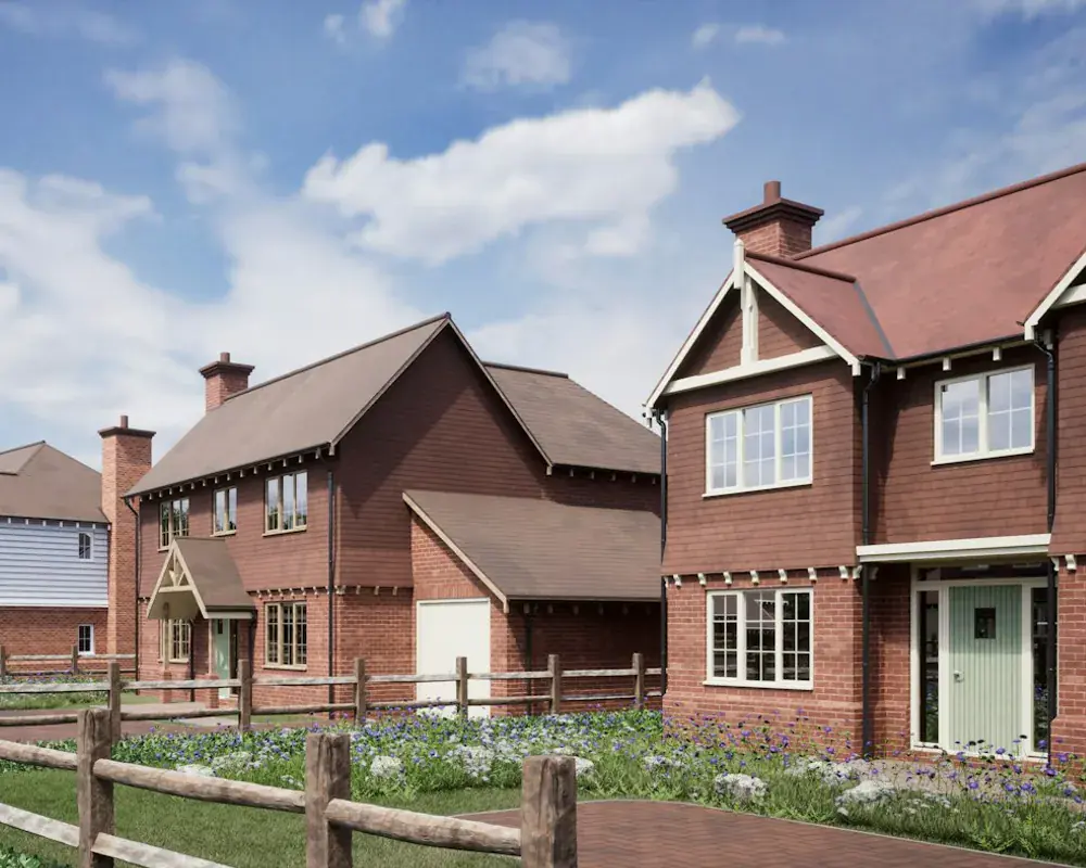 UK brick houses with white fascia boards and rainwater guttering