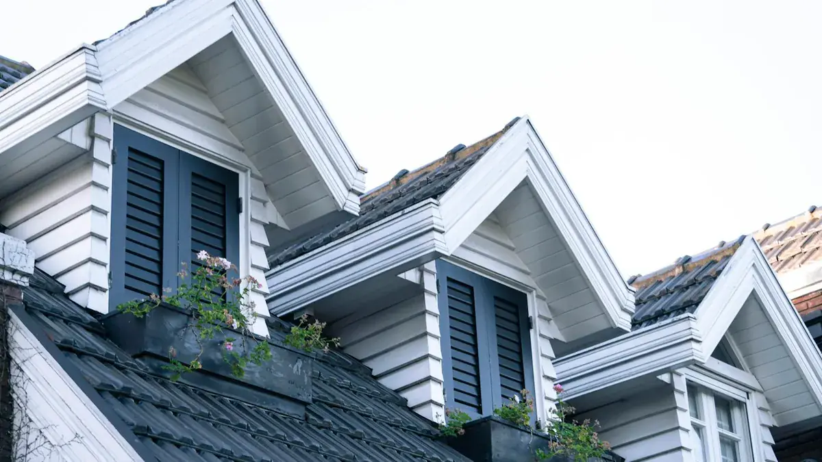 UK home with dormer windows and crisp white rooflines