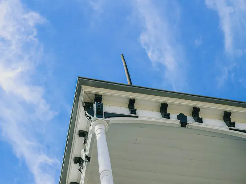 Ventilated white soffit boards fitted beneath the roof overhang of a UK property