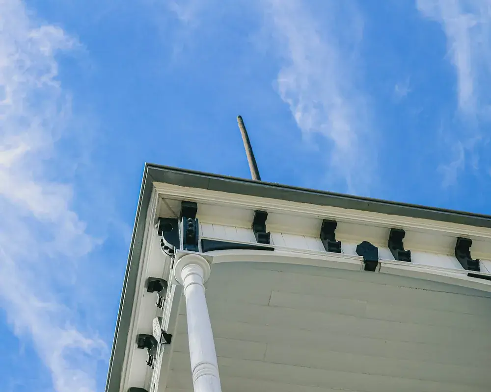 Ventilated white soffit boards fitted beneath the roof overhang of a UK property